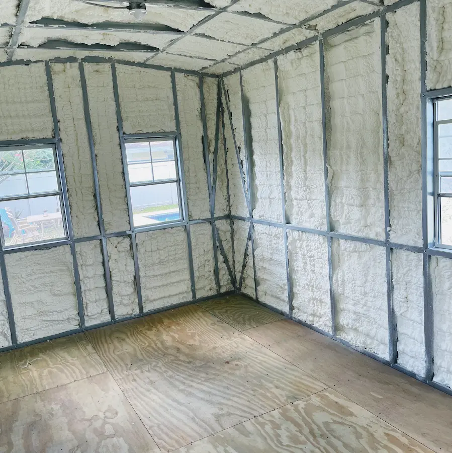 Closed-cell spray foam insulation applied to wall cavities in a residential project in Prineville
